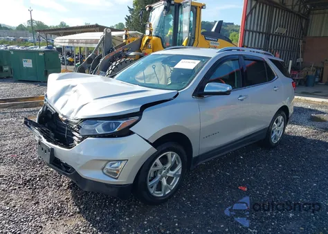 2018 Chevrolet Equinox Premier z USA, uszkodzony, nr VIN 2GNAXVEV8J6234355